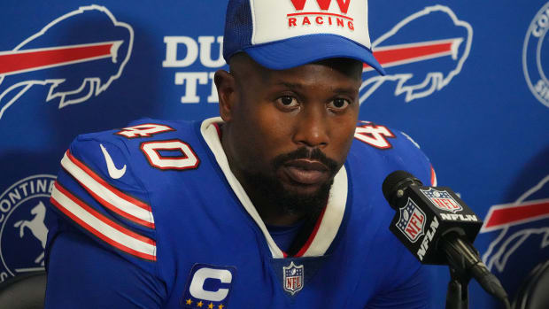 Von Miller wearing his Bills jersey at a press conference